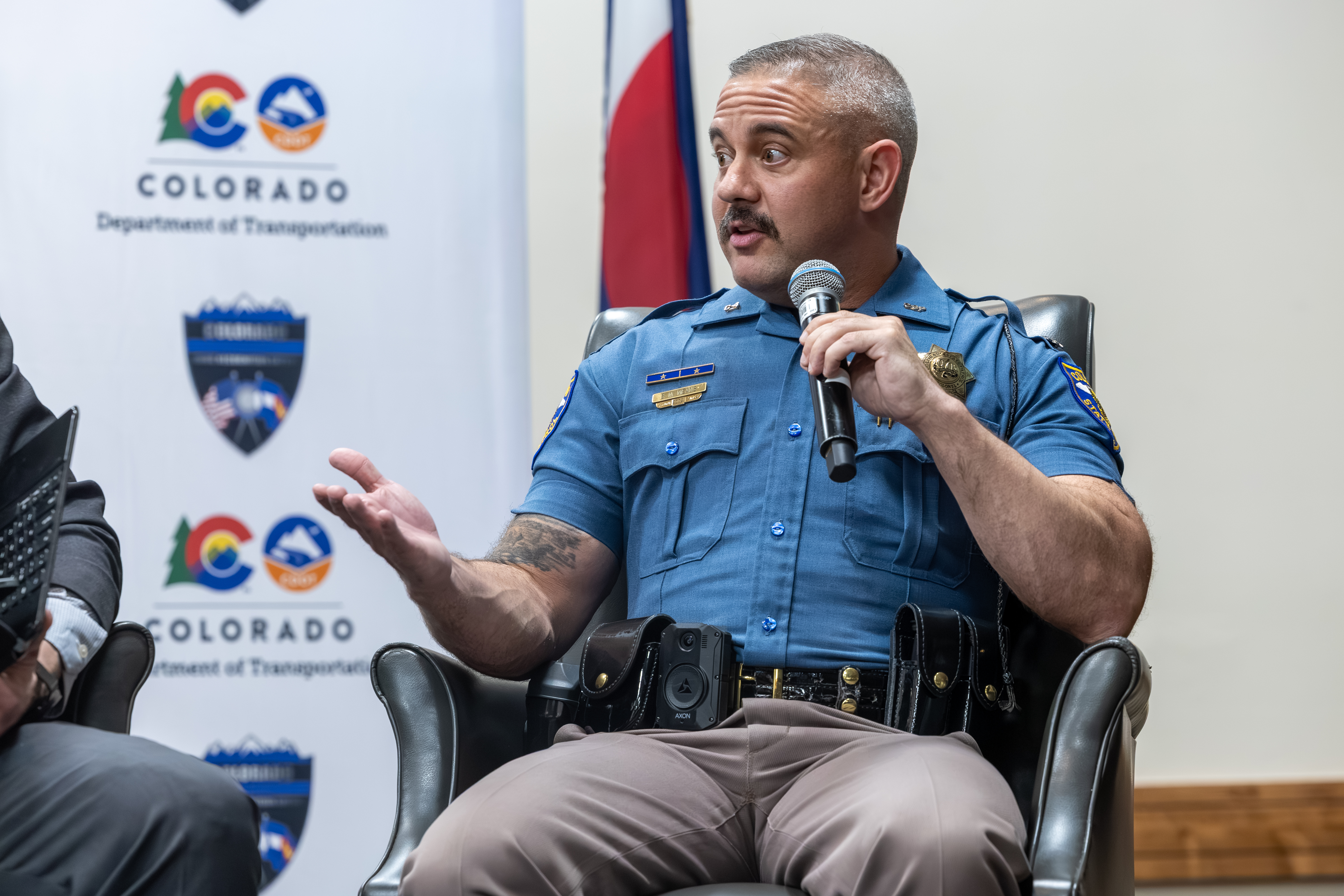 police officer at the microphone